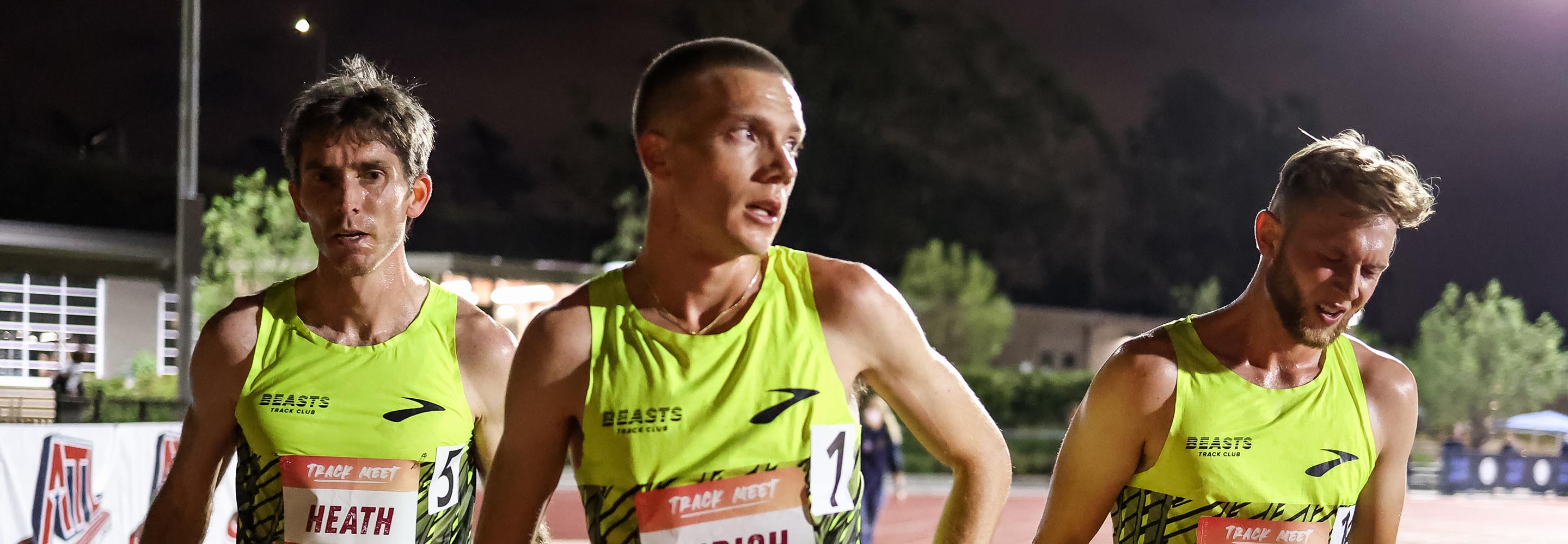 Three Brooks Beasts standing on a track